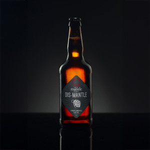 Mantle Dis-Mantle 5.8% Alc. Deep Amber Ale